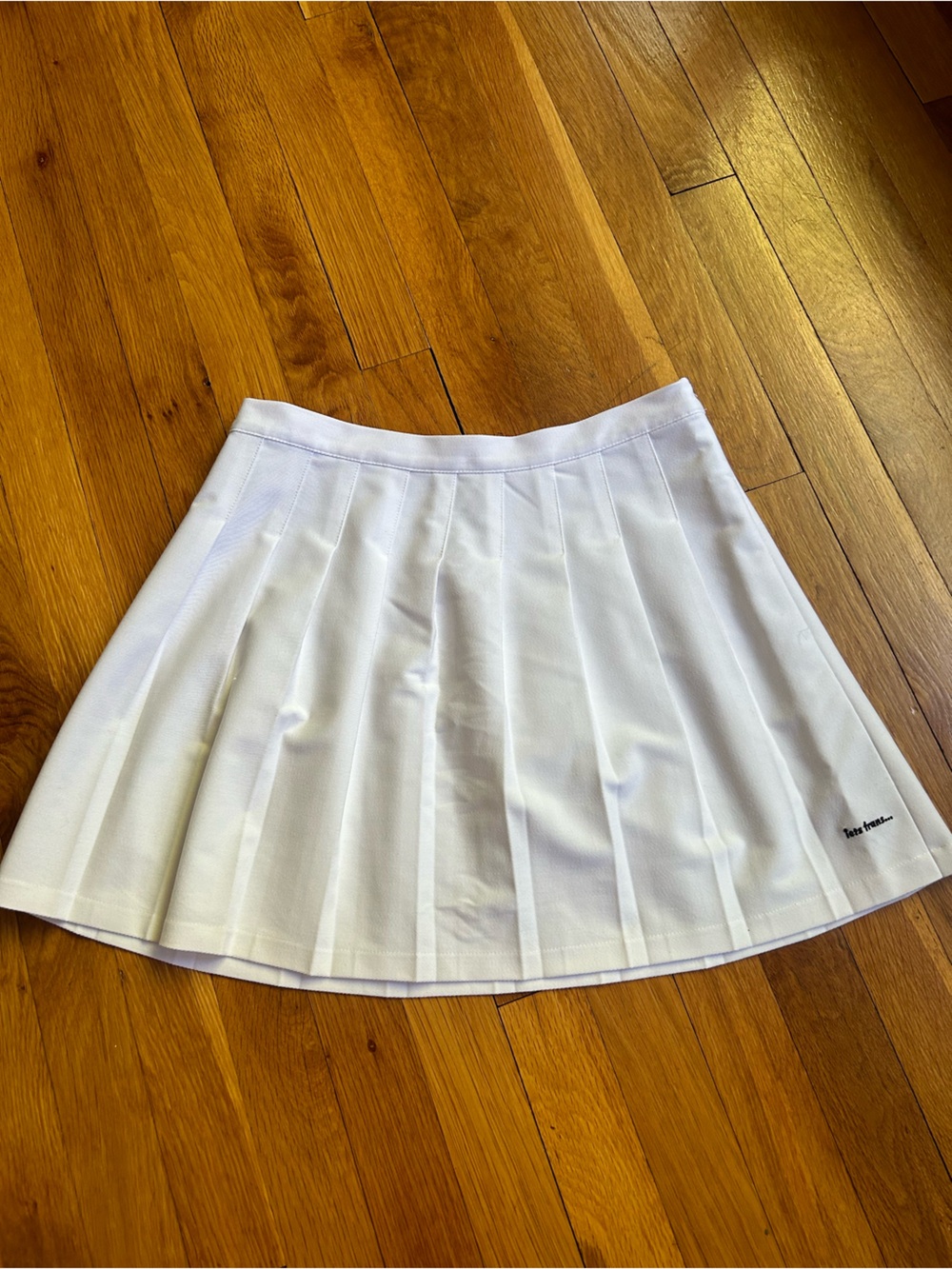 White Pleated Skater Skirt - Tennis-Inspired Circle Silhouette